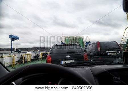 Klaipeda, Latvia - April 02, 2018: Cars On The Ferry In Klaipeda Near Curonian Spit In A Cloudy Day