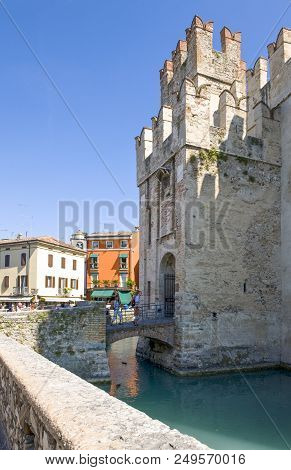 Sirmione, Italy - August 10, 2008: Garda Lake, The Rocca Scaligera Castle (xiii Century)