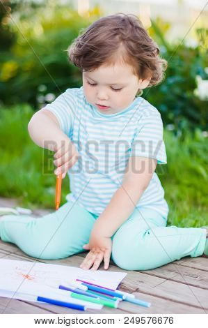 Adorable Little Girl Drawing With Felt-tip Pens Outdoors. Summer Leisure. Talantes Kids, Early Art E