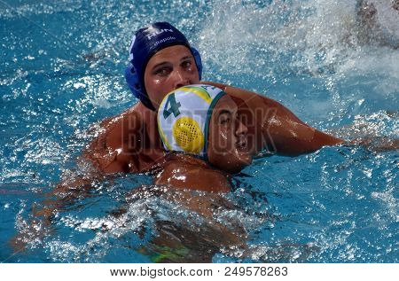 Budapest, Hungary - Jul 17, 2017. TOROK Bela, hungarian waterpolo player (in blue) fights with KAYES Joe (AUS). FINA Waterpolo World Championship was held in Alfred Hajos Swimming Centre.