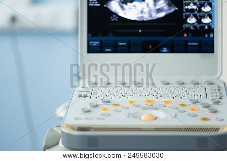 Orange And Gray Buttons Of The Keyboard Of The Device For Ultrasound Examination On The Background O