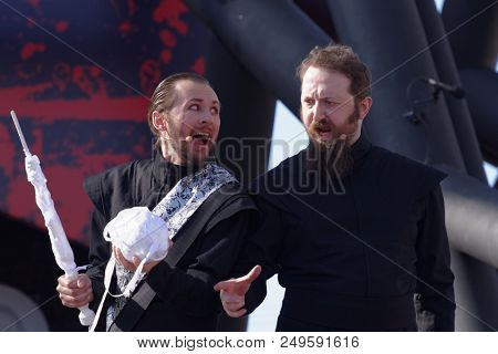 ST. PETERSBURG, RUSSIA - JULY 15, 2018: Dmitry Kondratiev as Macbeth (left) and Mikhail Kolelishvili as Banquo in the opera Macbeth outdoors during the festival All Together Opera