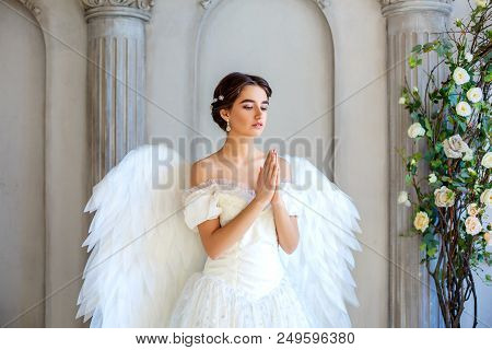 Beautiful Woman With Angel Wings Inspires Beauty