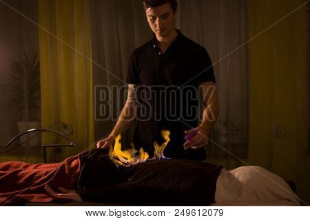 Chinese Fire Massage - Huo Liao Therapy. Traditional Chinese Medicine, Fire Treatment And Bodycare C