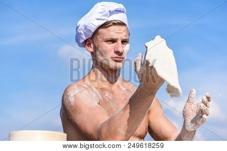 Baker At Working With Dough, Cooking Pizza. Man Muscular Pizzaiolo Or Cook Preparing Pizza. Pizzaiol