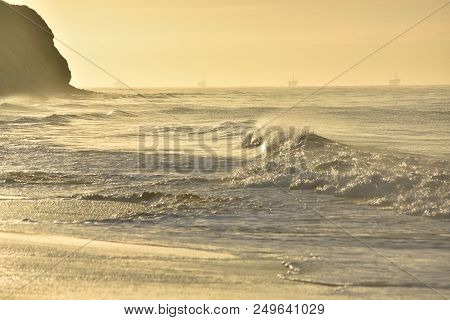 Sparkling Waters Moving Onto The Sandy Shore