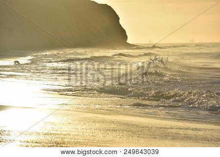 Beautiful Water From The Ocean Crashing Onto The Coast