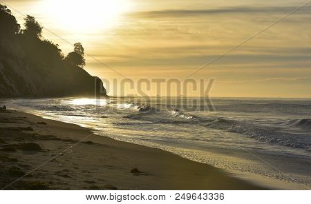 Stunning Sunrise On The Coastal Shore Of California