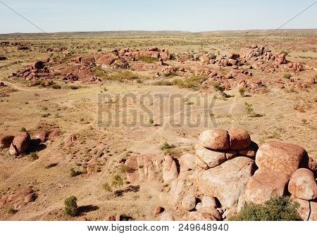 Massive Boulders Formed By Erosion In The Karlu Karlu, Devils Marbles Area Of The Outback (northern 