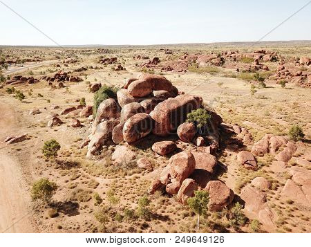 Massive Boulders Formed By Erosion In The Karlu Karlu, Devils Marbles Area Of The Outback (northern 