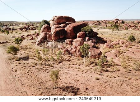 Massive Boulders Formed By Erosion In The Karlu Karlu, Devils Marbles Area Of The Outback (northern 