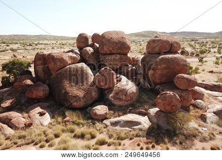 Massive Boulders Formed By Erosion In The Karlu Karlu, Devils Marbles Area Of The Outback (northern 