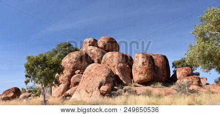 Massive Boulders Formed By Erosion In The Karlu Karlu, Devils Marbles Area Of The Outback (northern 