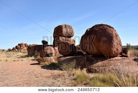 Massive Boulders Formed By Erosion In The Karlu Karlu, Devils Marbles Area Of The Outback (northern 
