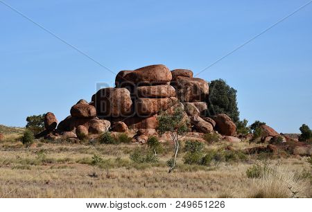Massive Boulders Formed By Erosion In The Karlu Karlu, Devils Marbles Area Of The Outback (northern 