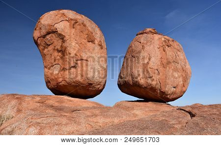 Massive Boulders Formed By Erosion In The Karlu Karlu, Devils Marbles Area Of The Outback (northern 