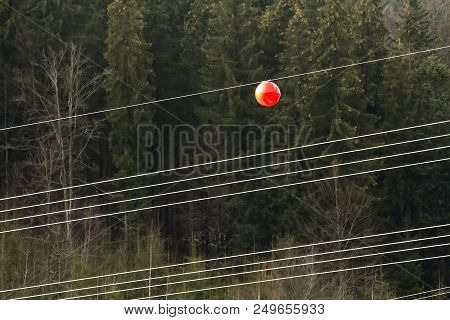 High Voltage Power Line With Big Ball For Warning Pilots, Low Flying Aircraft And Helecopter.