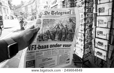 Paris, France - Jul 16, 2018: Man Buying De Telegraaf Newspaper Announcing France Champion Title Aft