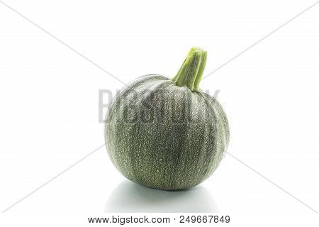 Big Round Zucchini On White Background - Courgette