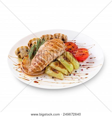 Plate Of Grilled Chicken With Vegetables Isolated On White Background. Photo For The Menu