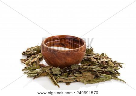 Calea Zacatechichi Herb Leaves With Tea In Wooden Bowl Isolated On White Background.