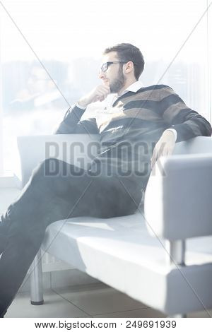 Close Up. Businessman With A Cigarette During A Coffee Break.