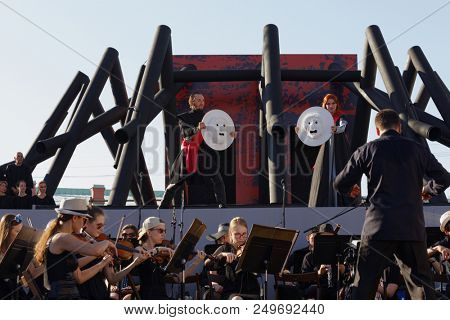 ST. PETERSBURG, RUSSIA - JULY 15, 2018: Dmitry Kondratiev as Macbeth (left) and Julia Gertseva as Lady Macbeth in the opera Macbeth outdoors during the festival All Together Opera