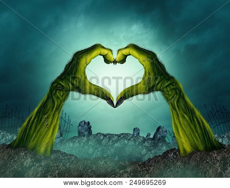 Zombie Hand Heart Shape In A Creepy Night Graveyard Background As A Green Halloween Arms Emerging Fr