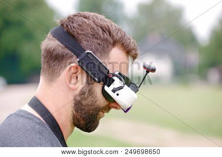 Young man wearing FVP goggles. Headshot