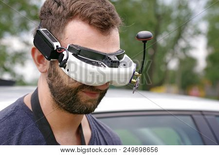 Young man wearing FVP goggles. Headshot