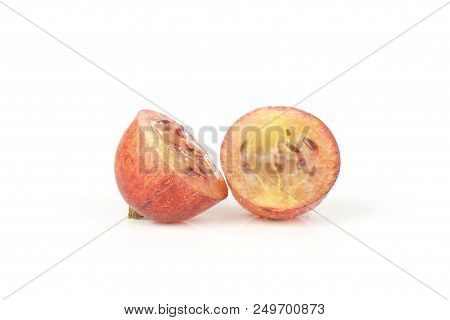 Group Of Two Halves Of Fresh Red Gooseberry Hinnomaki Variety One Sliced Berry Isolated On White