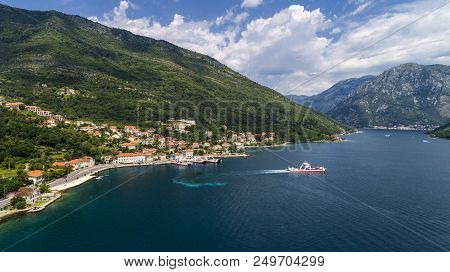Aerial Beautiful View From Above To Kotor Bay And Regular Passenger Ferry From Lepetane To Kamenari 