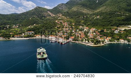 Aerial Beautiful View From Above To Kotor Bay And Regular Passenger Ferry From Lepetane To Kamenari 