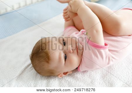 Cute Baby Taking Feet Image & Photo (Free Trial) | Bigstock