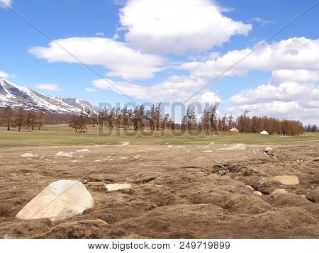 Mongolian Natural Landscapes Surrounded By Mountains And Rocks.