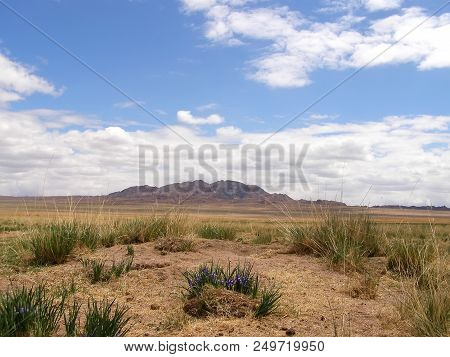 Mongolian Natural Landscapes Surrounded By Mountains And Rocks.