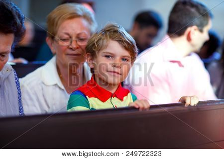 Grandmother Taking Child, Kid Boy To School. Pupil Of Primary School Go Study. Senior Woman And Gran