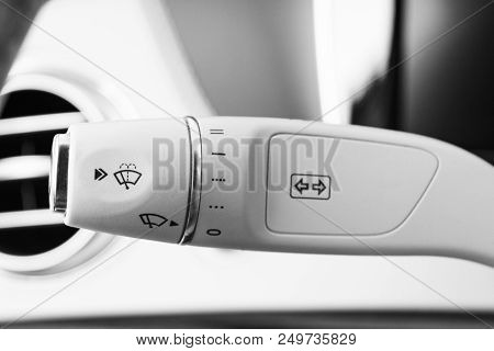 Wipers Switch Control. White Leather Modern Car Interior Detail. Adjusting Speed Of Screen Wipers In