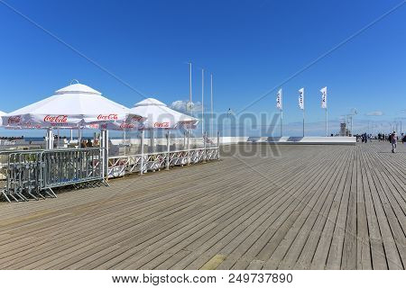 Sopot, Poland - June 6, 2018: Wooden Sopot Pier In Sunny Day. It Is The Longest Wooden Pier In Europ