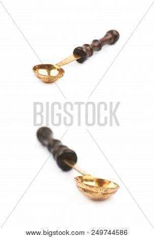 Wax Melting Spoon Laddle Isolated Over The White Background , Set Of Several Different Foreshortenin