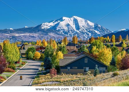 Residential neighborhood in Colorado at autumn, USA. Mount Sopris landscape.