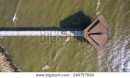 Aerial View Of The Wooden Pier Or Jetty With Hut At Esplanade In Sipitang Town,sabah Borneo,malaysia