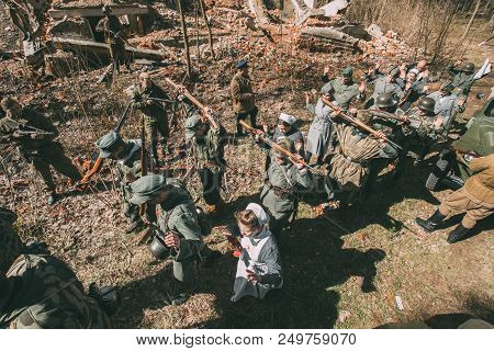 Gomel, Belarus - April 23, 2017: Re-enactors Dressed As Russian Soviet Soldiers And German Infantry 