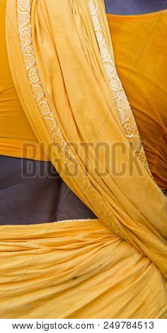 Back Of Indian Girl In Yellow Saree, Close-up