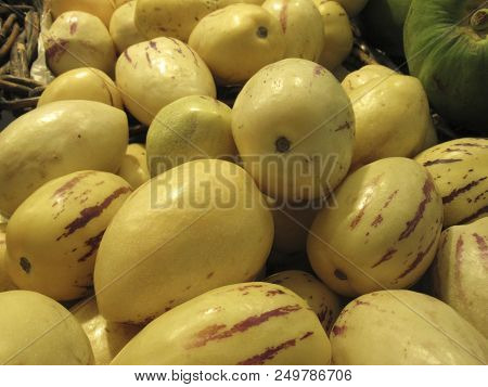 Pepino, Pepino Melon, Solanum Muricatum, Pepino Dulce
Yellow Fruits With Purple Streaks.