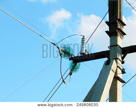 Electric Wires On A Support In A Blue Sky