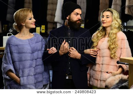 Friends In Shop: Ladies And Gentleman In Expensive Overcoats. Fashion And Shopping Concept. Man And 