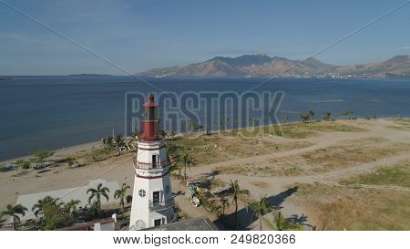 Coastline With Beach And Lighthouse, Mountains. Aerial View: Coast Sea With Hotels, Resorts, Subic B