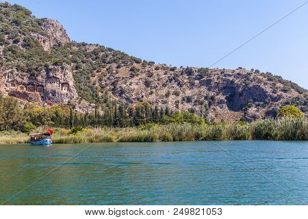 Lycian Tombs In The Mountains On The Dalyan River, Turkey. Dalyan Canal View. Dalyan Is Populer Tour