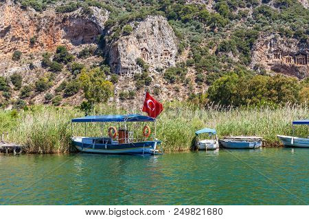 Lycian Tombs In The Mountains On The Dalyan River, Turkey. Dalyan Canal View. Dalyan Is Populer Tour